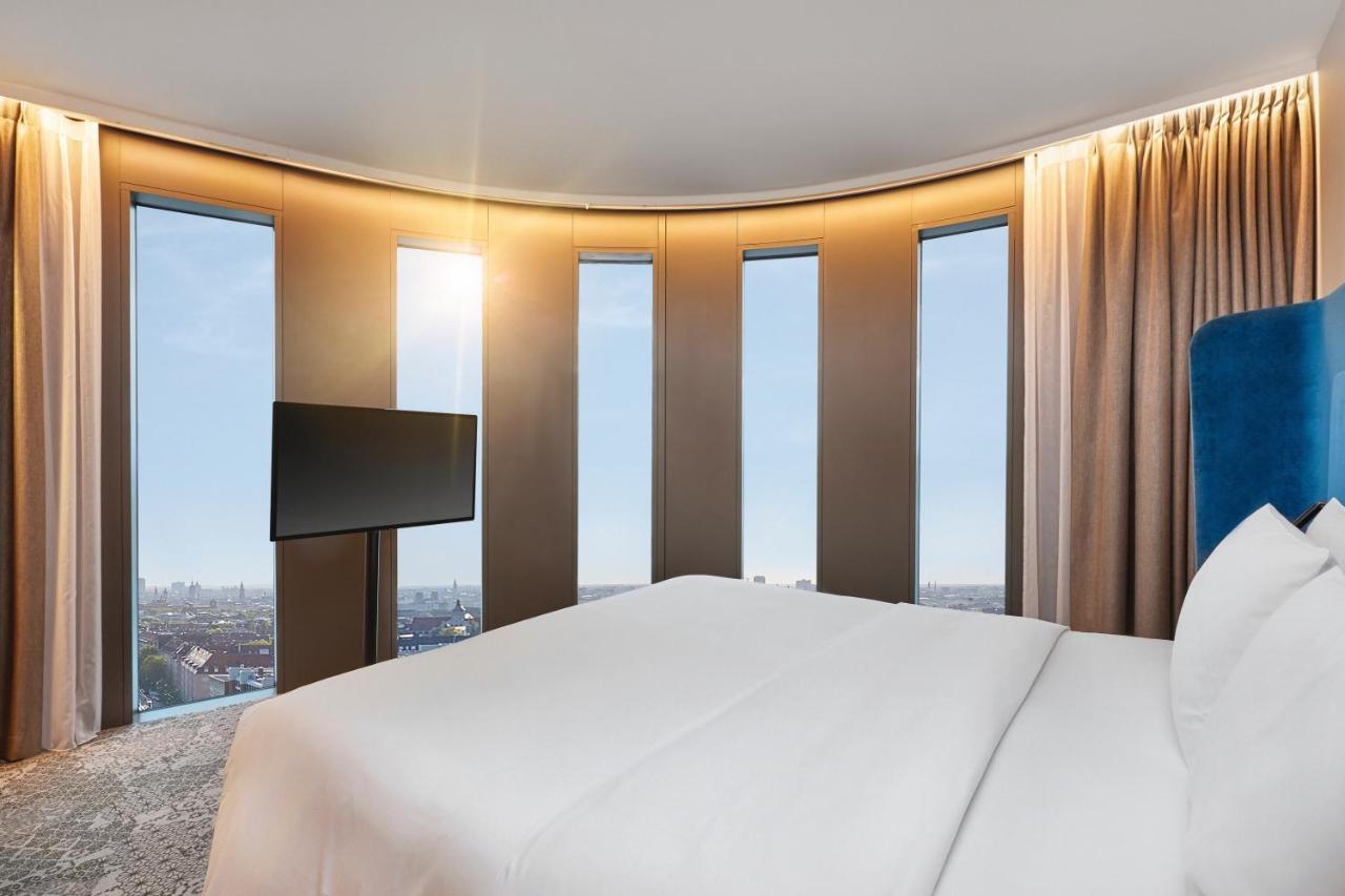 ไฮเปเรียน โฮเต็ล มึนเชิน Hotel มิวนิก ภายนอก รูปภาพ A bedroom at the hotel