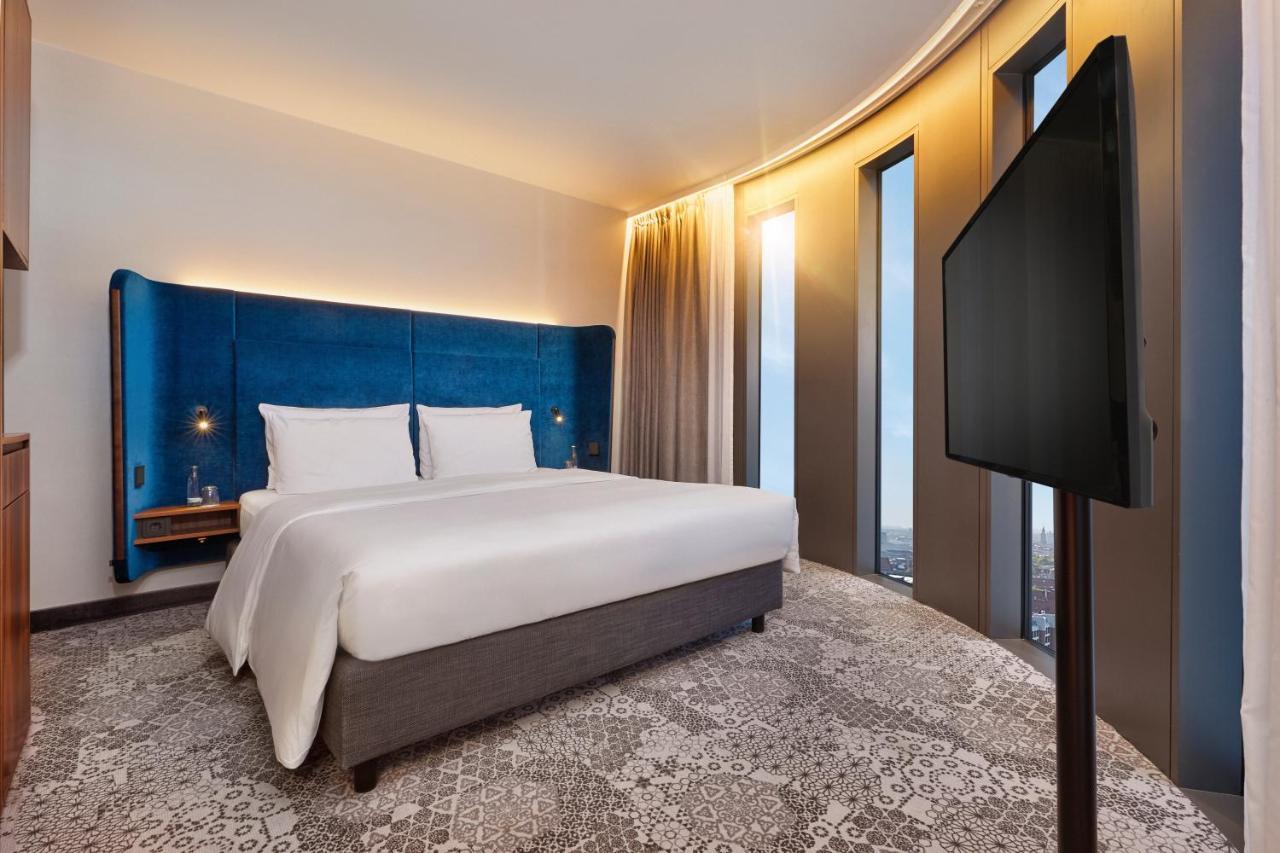 ไฮเปเรียน โฮเต็ล มึนเชิน Hotel มิวนิก ภายนอก รูปภาพ A bedroom at the hotel