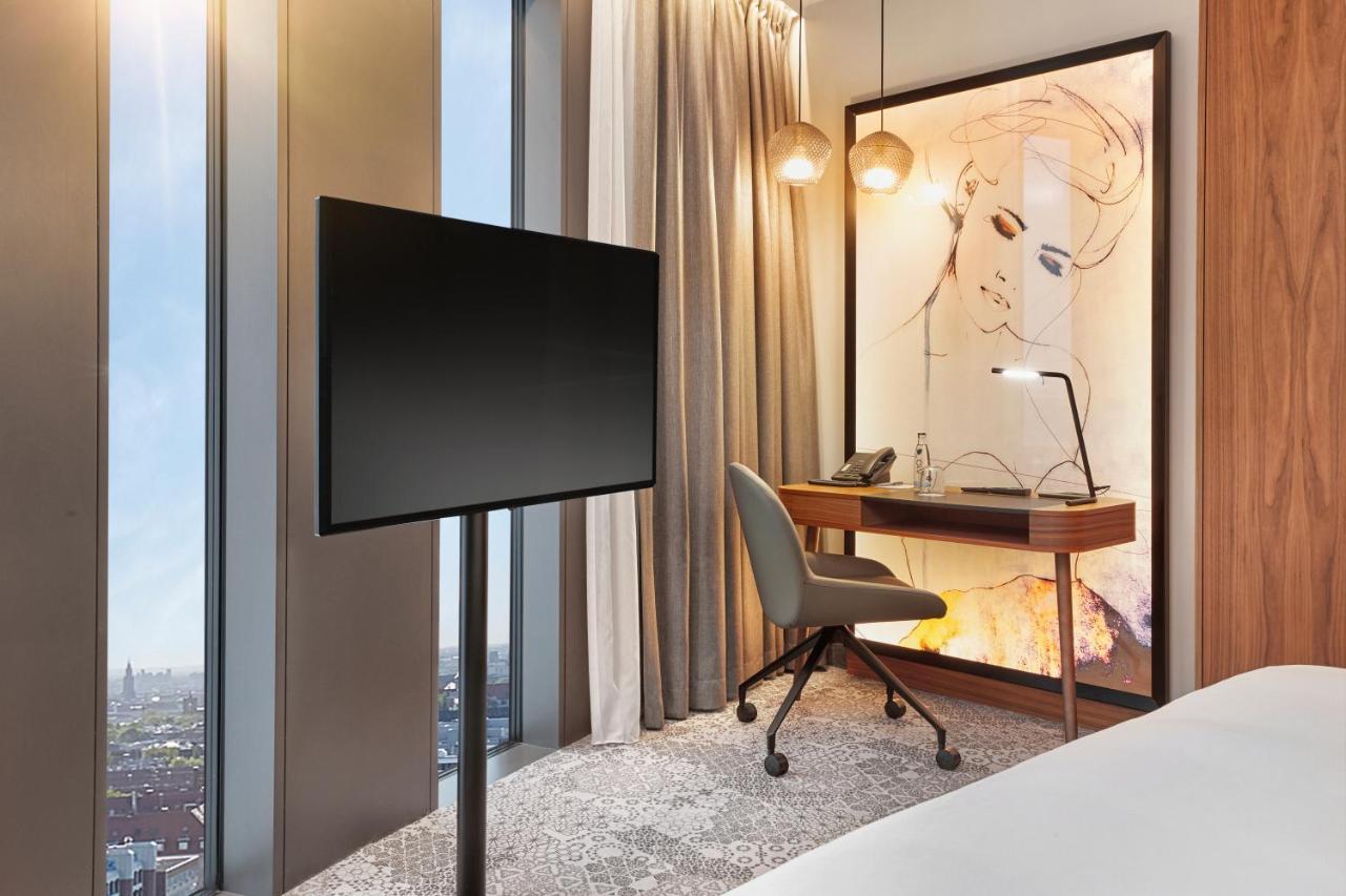 ไฮเปเรียน โฮเต็ล มึนเชิน Hotel มิวนิก ภายนอก รูปภาพ A room at the hotel