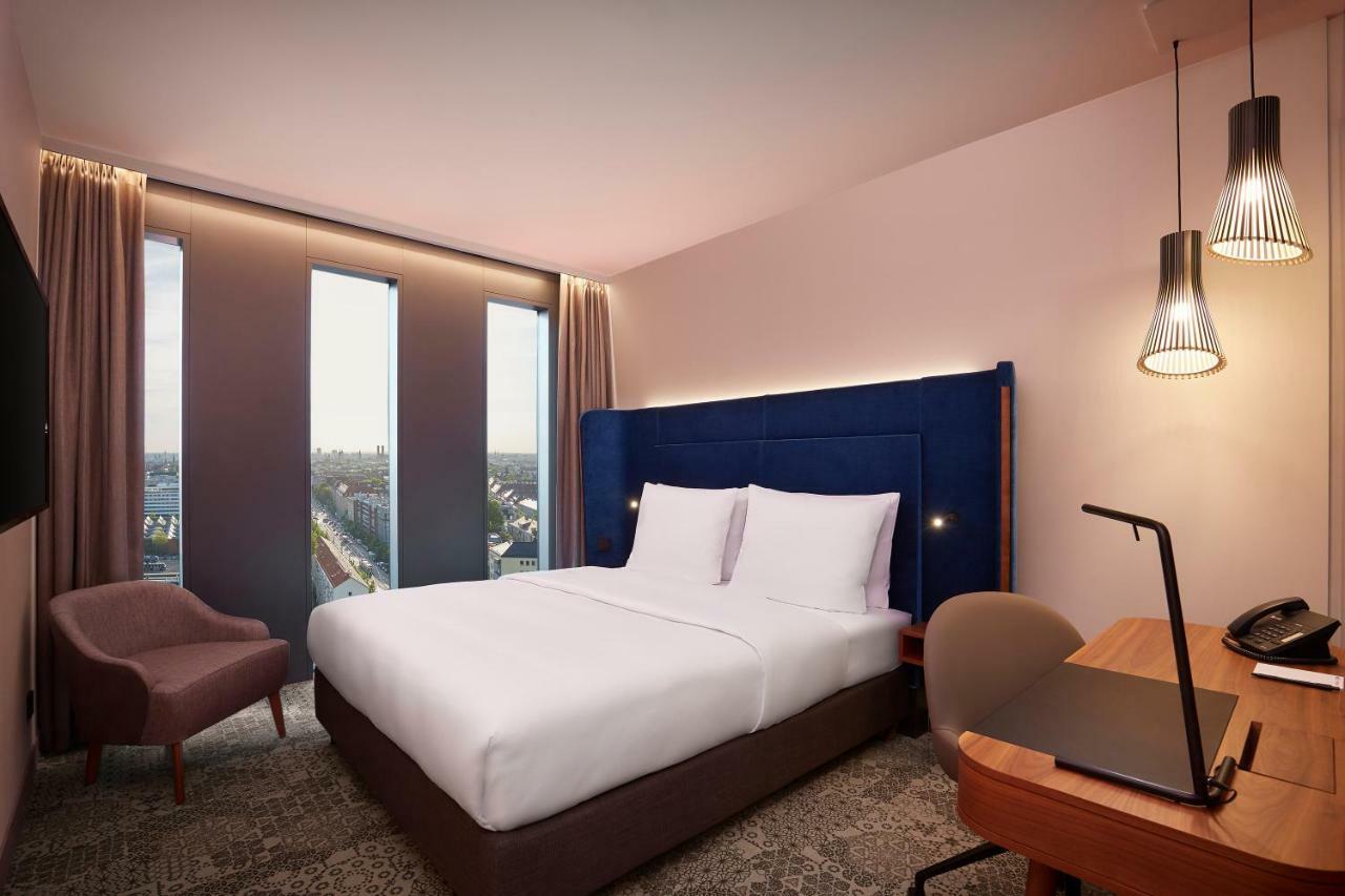 ไฮเปเรียน โฮเต็ล มึนเชิน Hotel มิวนิก ภายนอก รูปภาพ A room at the hotel
