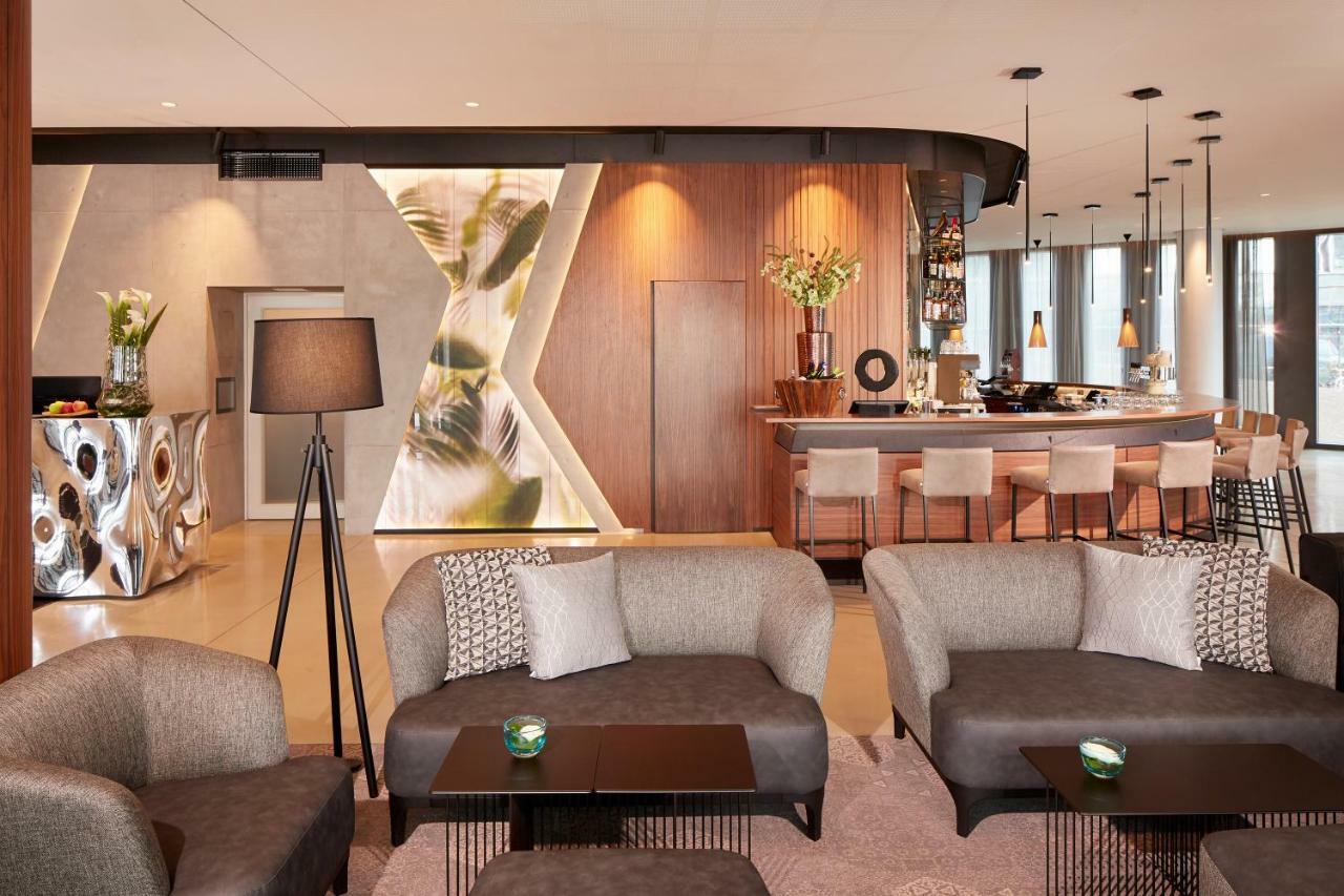ไฮเปเรียน โฮเต็ล มึนเชิน Hotel มิวนิก ภายนอก รูปภาพ The lounge at the airport